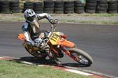 Photo MaitreFou - Auteur : Michael - Mots clés :  moto supermotard terre asphalte piste jamaique saut championnat saint denis 113 ktm 